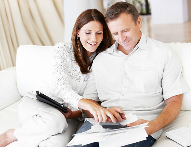 istock Pleasantly surprised by the state of their finances 182062963