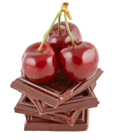 Fresh cherries over chocolate blocksSimilar files: