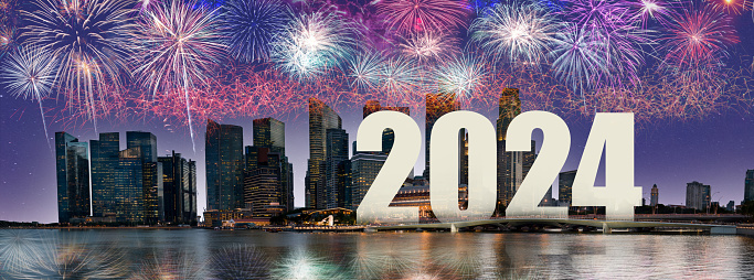 New Year 2024 in the city. Panoramic city at night with fireworks. City celebrations