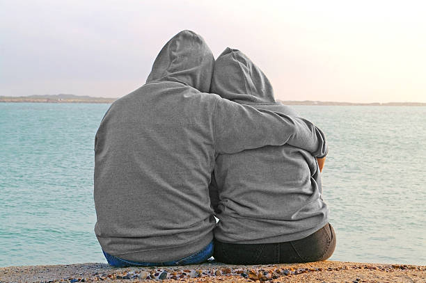 istock couple on the rocks 182063986