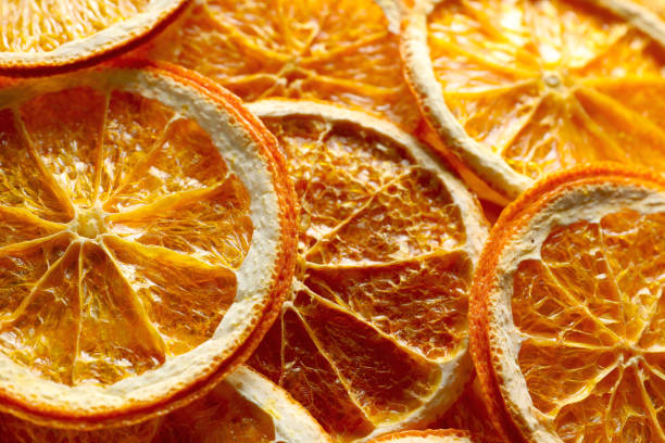 istock Many dry orange slices as background, top view 1820649161