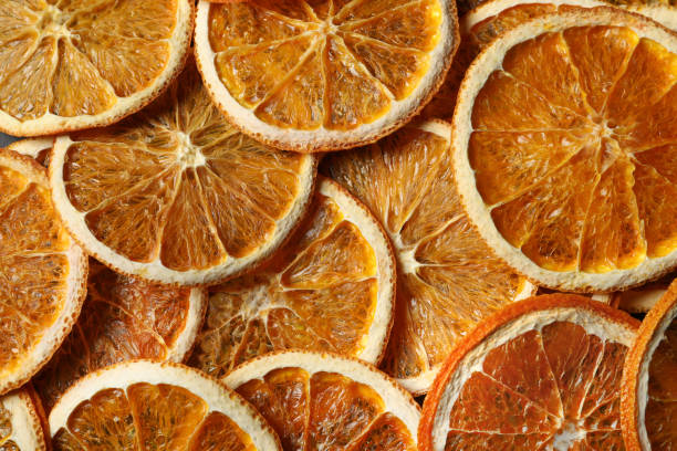istock Many dry orange slices as background, top view 1820651733