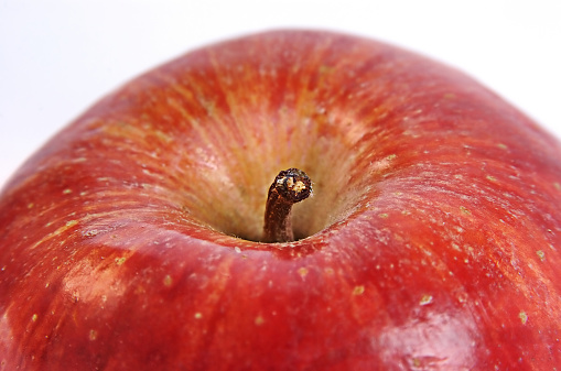 Close up shot of a red apple.