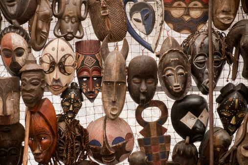 Wooden fake African masks sold in a street market