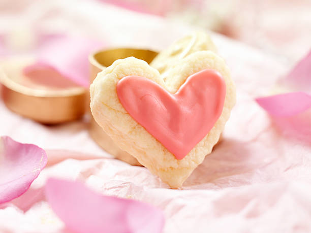 Heart Shaped Valentine Sugar Cookies with Rose Petals and Ribbons-Photographed on a 4x5 View Camera with a Hasselblad-39mb Digital Back