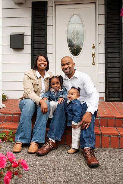 istock Happy Family at Home on Front Porch 182066862