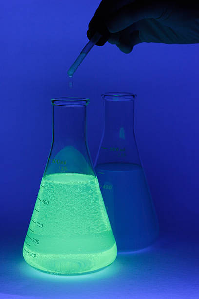 Glowing Erlenmeyer Flasks stock photo