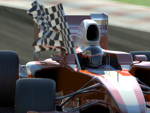 Close view of a open-wheel single-seater racing car car on a race track with the driver carrying a winning checkered flag. Modelling and design are my own. Very high resolution 3D render.