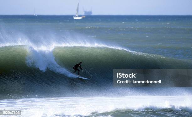 Surfer Drops In Stock Photo - Download Image Now - At The Bottom Of, Breaking Wave, Surfing