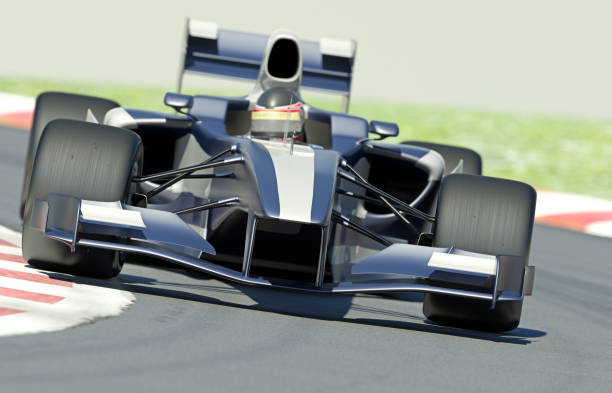 istock A blue and silver race car on a track 182067642
