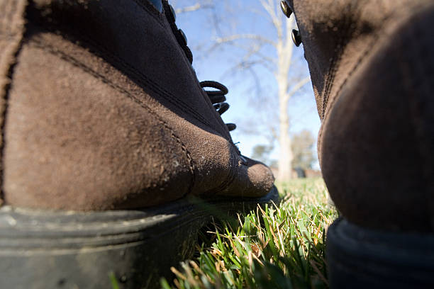 istock Write the title... Low angle view of two shoes. 182068193