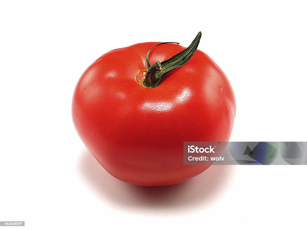 Deliciously Red #2 A beautiful ripe tomato. Close-up Stock Photo