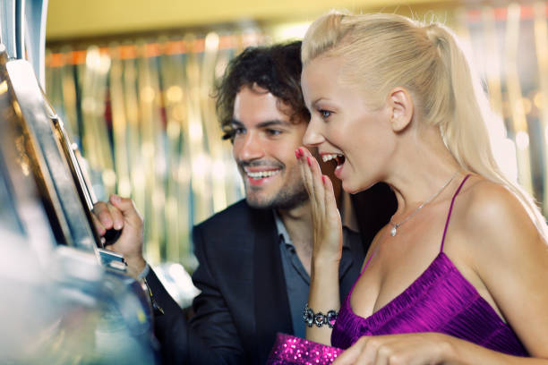 istock young couple gambling in the casino 182068728