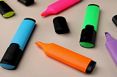 Bright color markers on light grey background