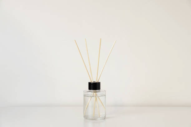 istock Aromatic reed air freshener on white table 1820768297