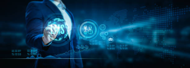 istock Businessman using a digital pen to the LMS (Learning Management System) web icon for lesson and online education, courses, applications, study, e-learning, and knowledge everywhere and every time. 1820777989