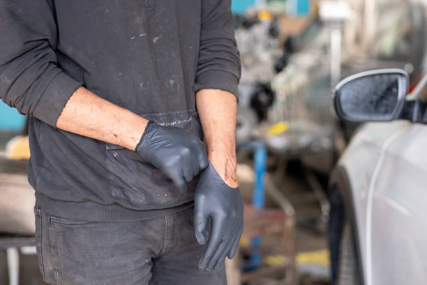istock auto mechanic wearing gloves 1820778576