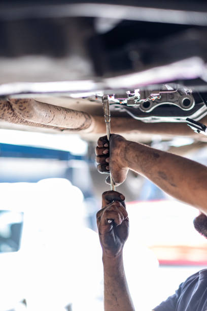 istock Man working on a vehicle in auto repair shop 1820779652