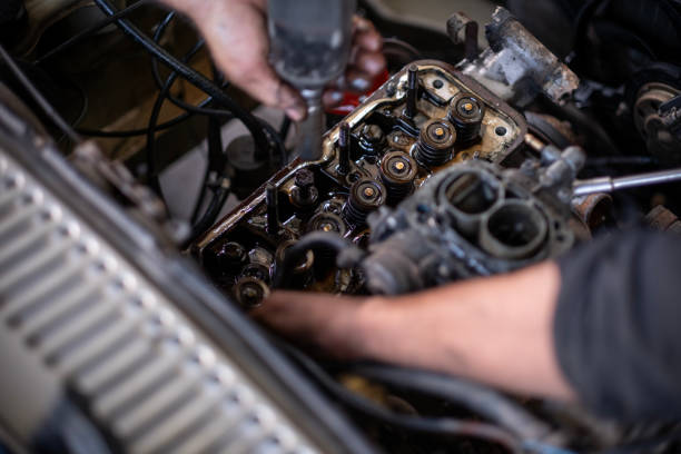 istock Automobile mechanic or repairing a car engine in automotive workshop 1820782680
