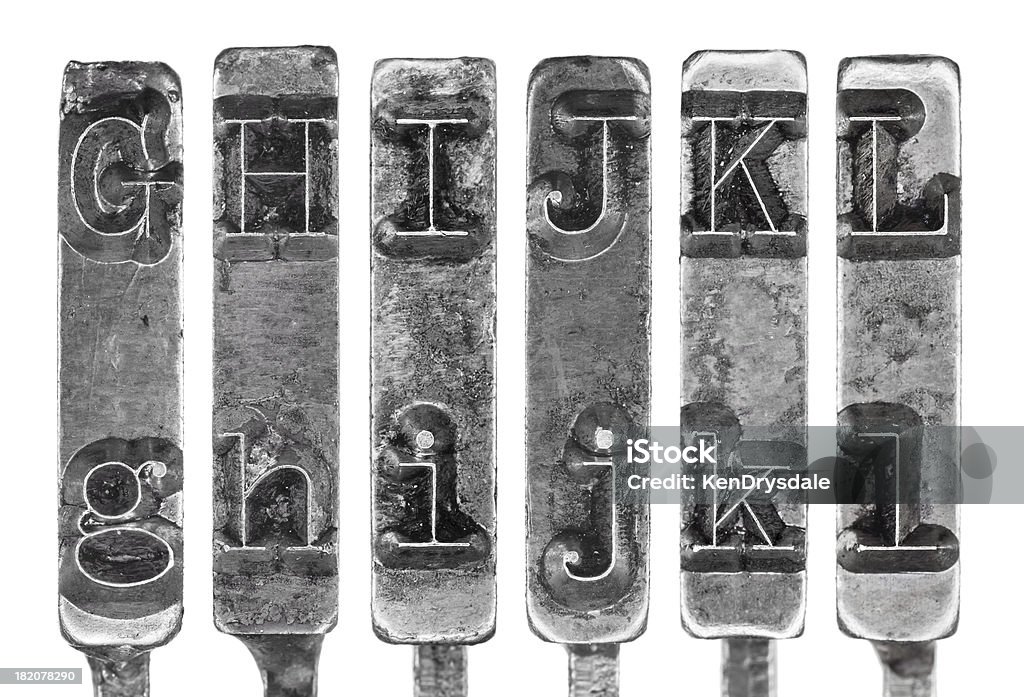 Old Typewriter Typebar Letters G to L Isolated on White Grungy, retro typography. Close-up shot of the letters G to L from a vintage manual typewriter. Isolated on white so the letters can be used independently. See my other images for the rest of the alphabet. Typewriter Stock Photo