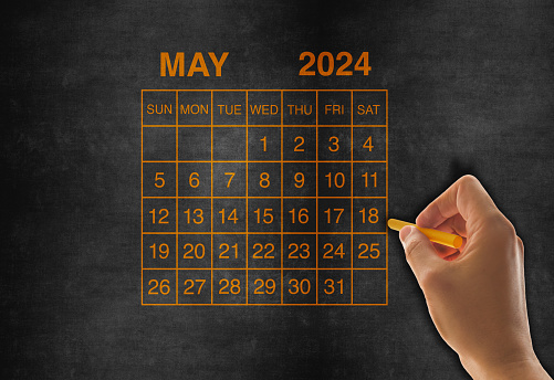 2024 calendar May on chalkboard