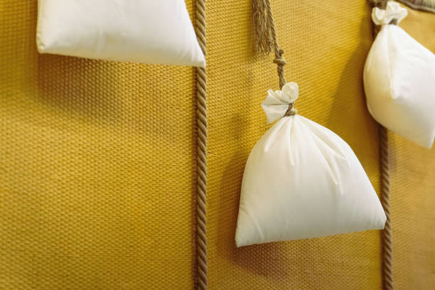 White bags with ballast on balloon basket