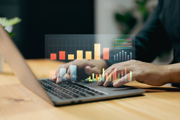 istock The business strategy involves using a laptop for digital marketing and making data warehouse purchases. 1820825036
