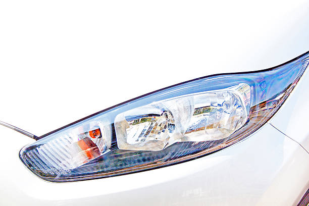 istock Left Side Closeup Of Vehicle Front Headlamp Assembly 182082628