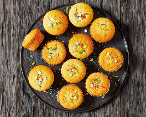 istock sweet lemon muffins on black plate, top view 1820830471