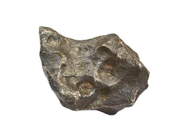 istock Metallic iron meteorite isolated on white. 182083229