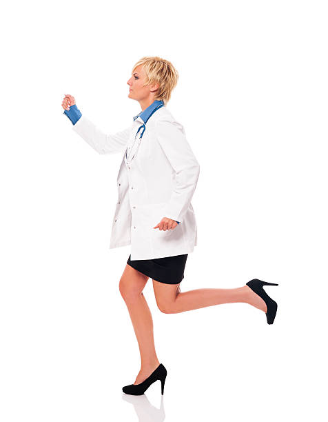istock Female doctor running for her patients 182083525