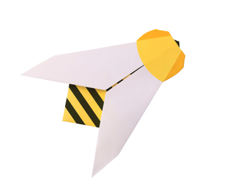 Origami paper bee on a white background