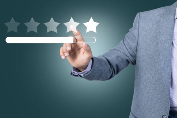 istock Five star feedback in business hand 1820889415