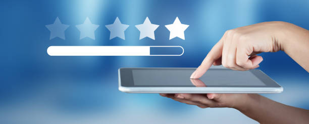 istock Five star feedback in business hand 1820889945