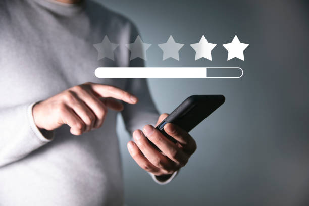 istock Five star feedback in business hand 1820889954