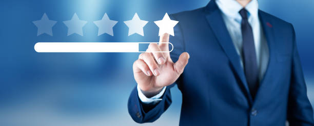istock Five star feedback in business hand 1820889956