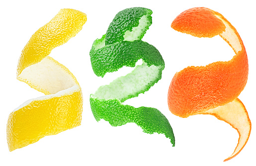 Collection of juicy citrus peels isolated on a white background. Lemon, lime and orange twist.