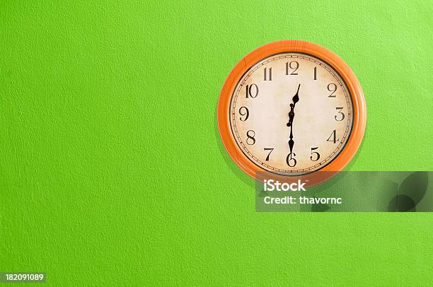 Clock Showing 1230 On A Green Wall Stock Photo - Download Image Now - 12 O'Clock, Alarm Clock, Black Color