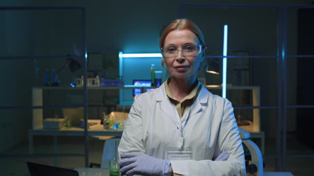 Portrait of Middle-Aged Female Scientist in Chemistry Lab