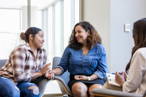 istock Mother and daughter reconcile during therapy session 1820933820