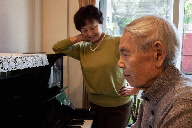istock Older Man plays Piano with his wife 1820966217