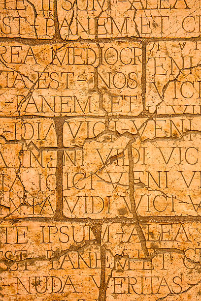 istock Cracked wall with Latin inscriptions and Roman letters. 182096717