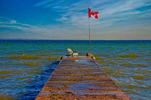 istock Adirondack Chair on a End of a Pier 1820990038