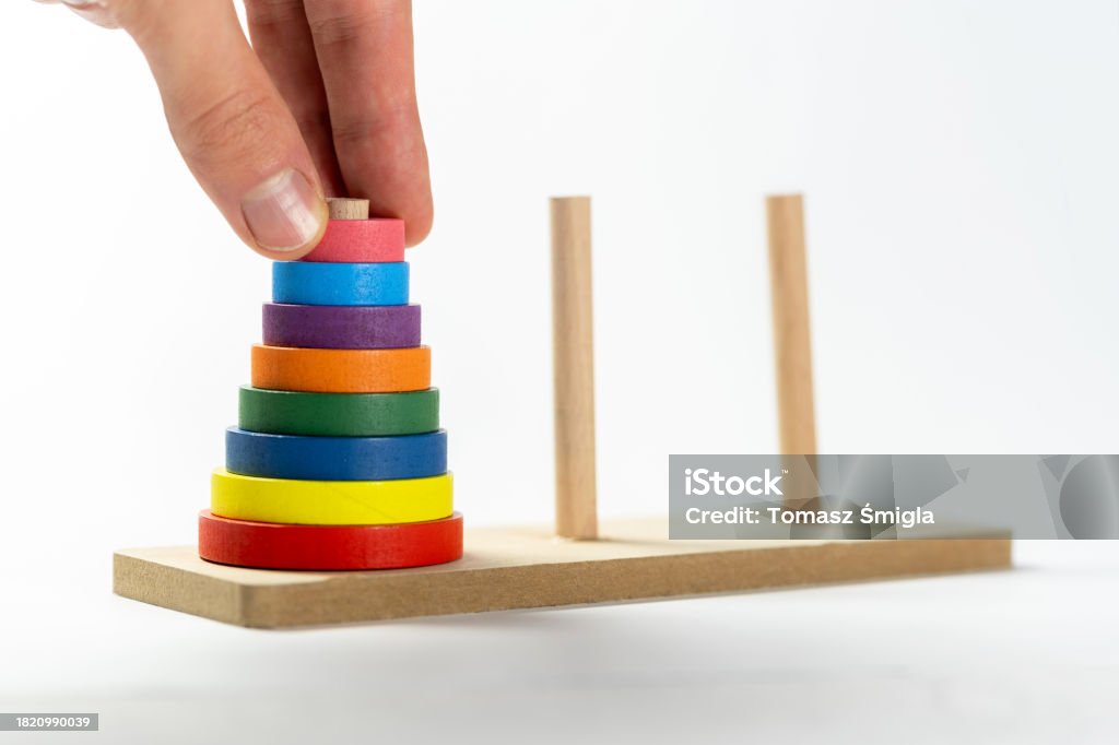 Solve Objects Man Solving A Tower Of Hanoi Moving Elements With His Hand Puzzle ...