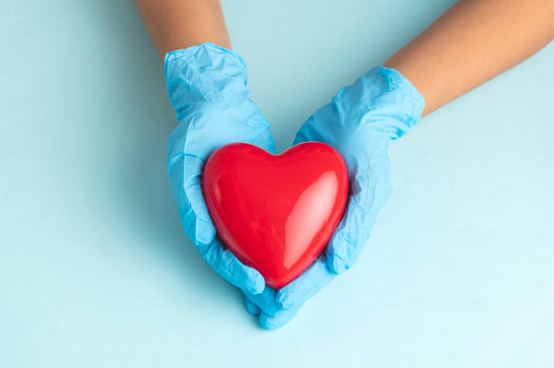istock Doctor holding heart 1820995772