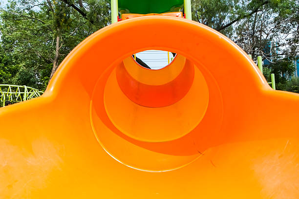 istock Colorful slider tunnel in a playground 182099912