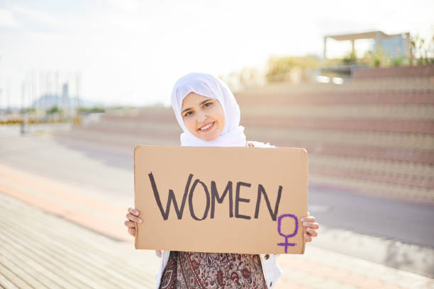 istock Muslim woman protesting for equality and women rights 1821015251
