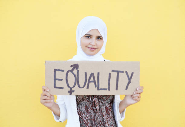 istock Young muslim woman protesting for equality and rights for women 1821016303