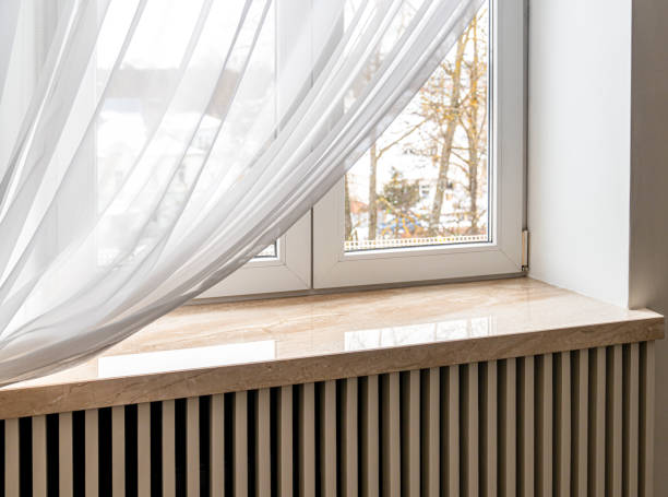 Modern window sill made of marble stone.