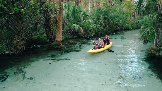 Couple Kayaking Down Florida Springs - Florida Freshwater River Springs - Wide Angle